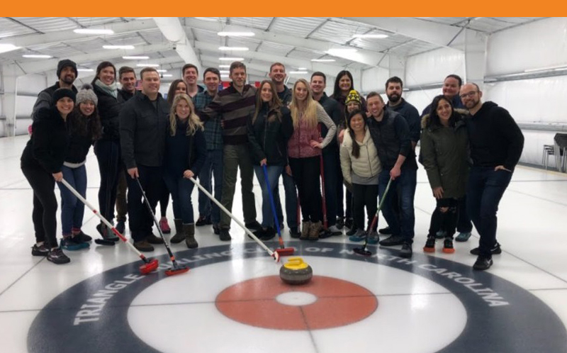 Photo of residents at a curling match