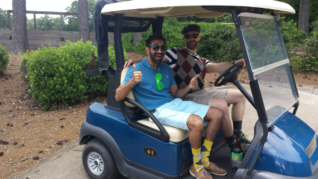 Trainees in golf cart