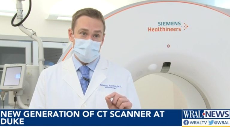 Dr. Amrhein with the new scanner