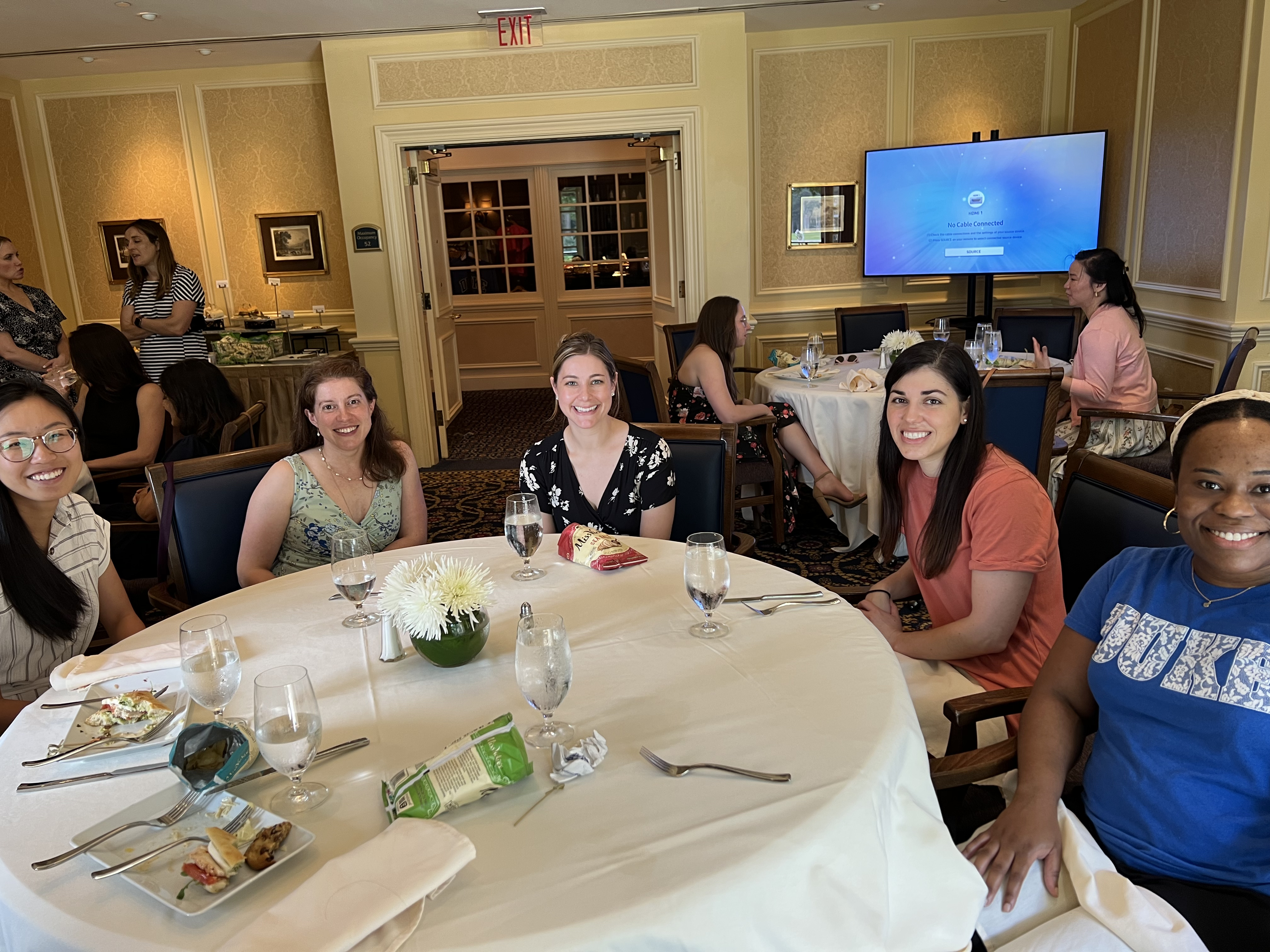 Women seated at table