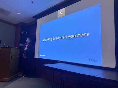 Screen with words negotiating employment agreements