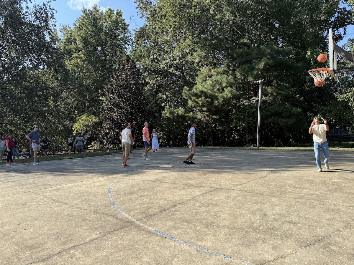 People on basketball court