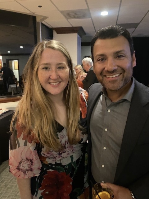 Two people smiling