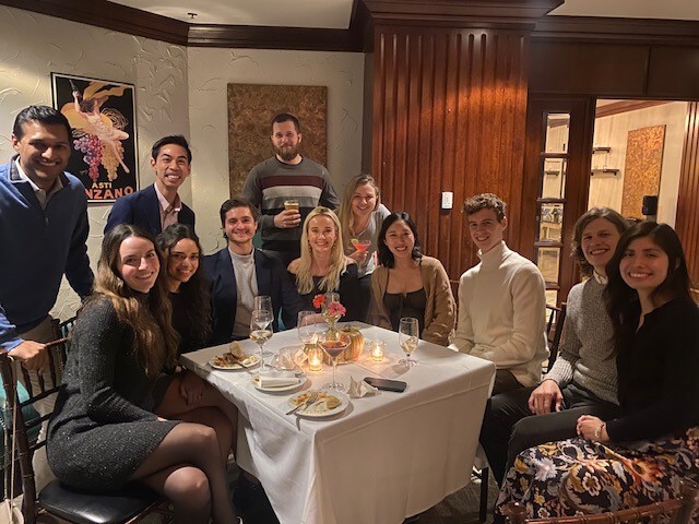 People around a table at a party