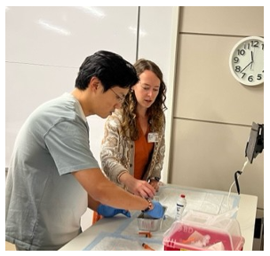 A medical student participates in the primer course. 