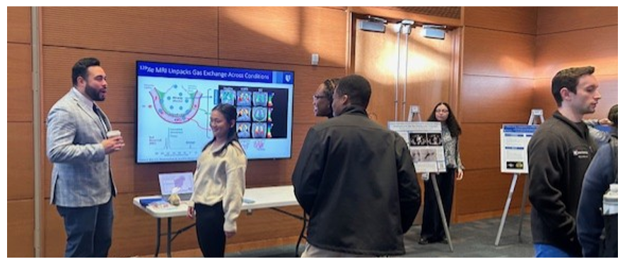 People talking at Research Day