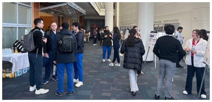 People looking at research posters